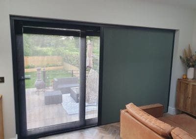 Best Fly Screens - Dual Screen with an anthracite grey frame. The privacy screen is half closed.